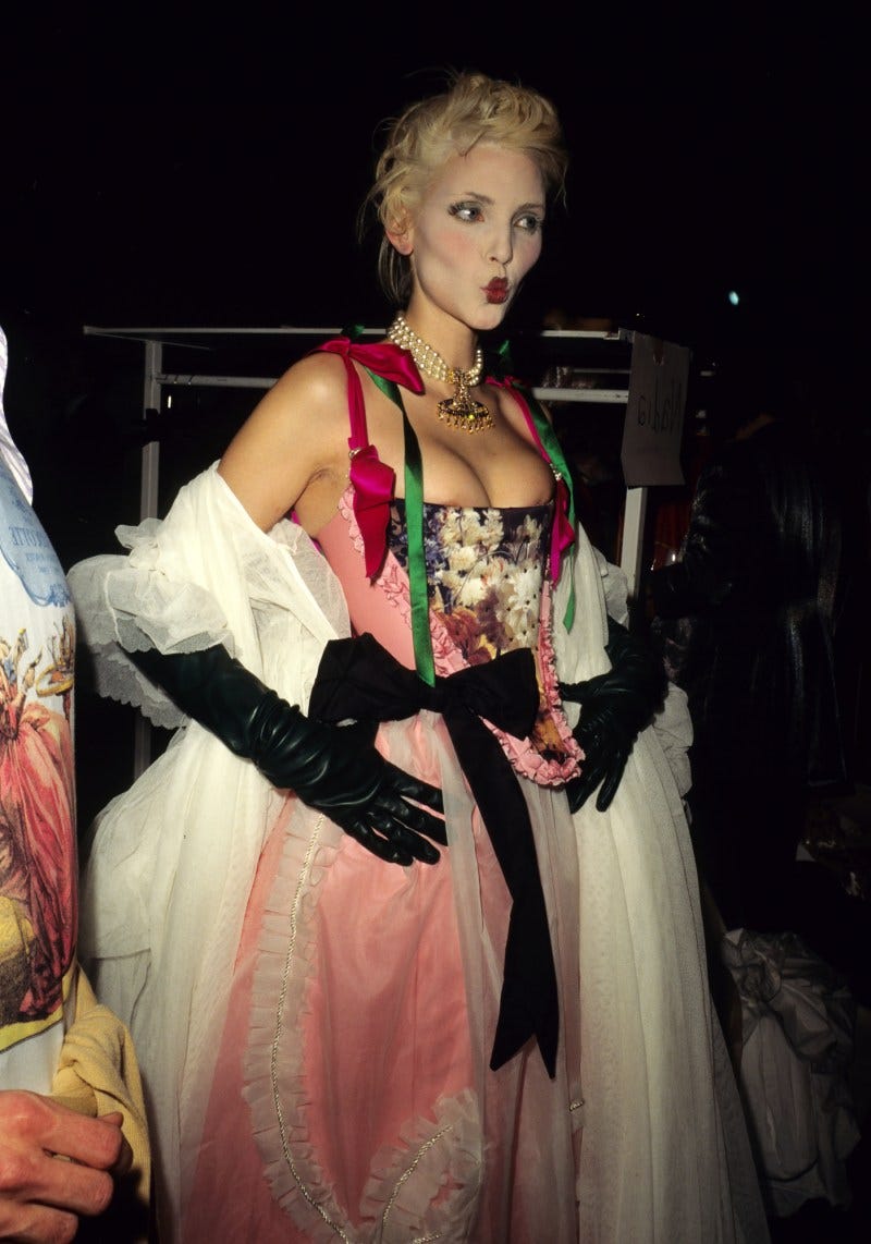 Nadja Auermann walks the runway for a Vivienne Westwood show during Paris Fashion Week in the 1990s