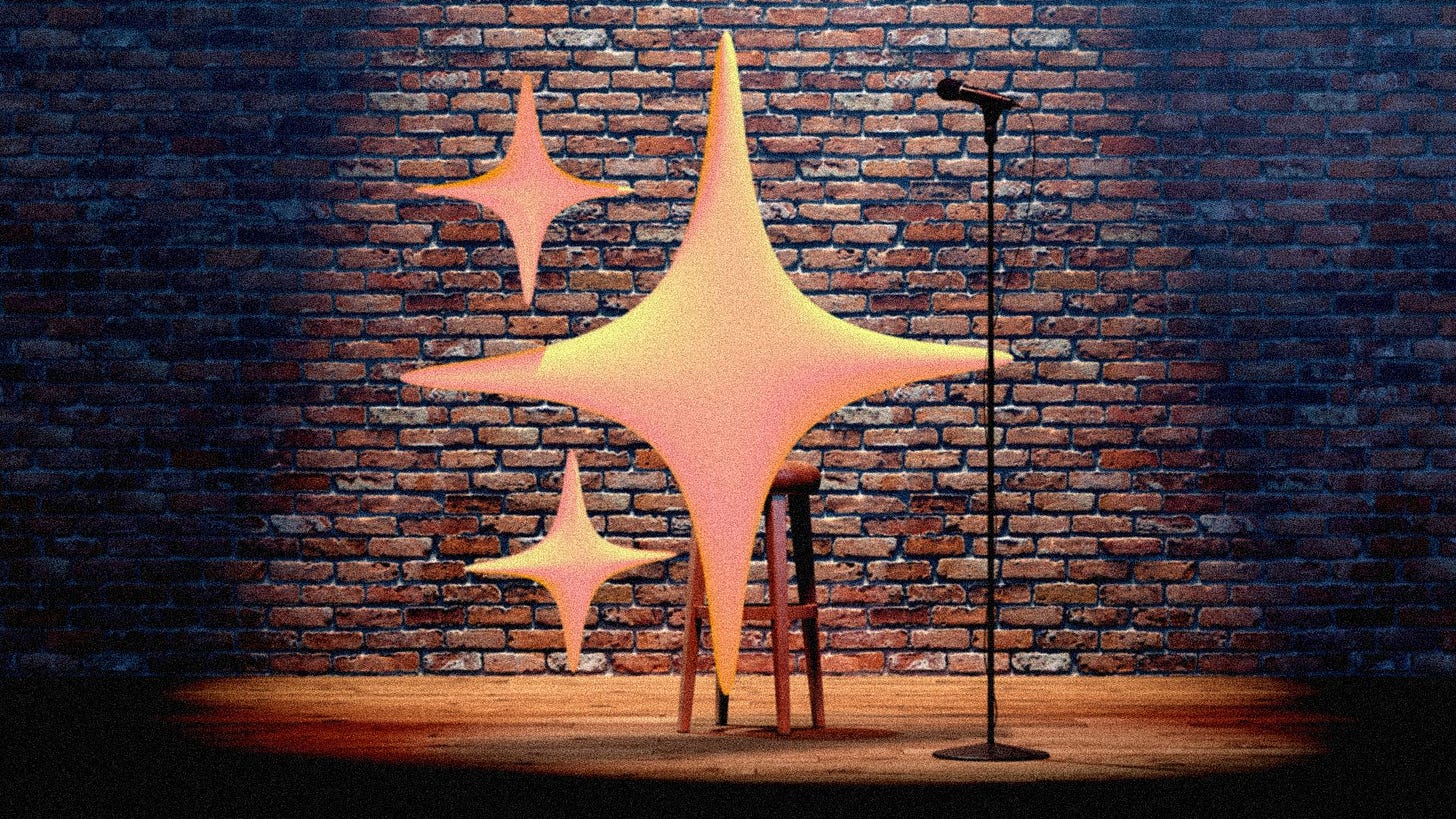 Animated illustration of a sparkle emoji under a spotlight, performing standup comedy on a stage with a microphone and a stool, in front of a brick wall.