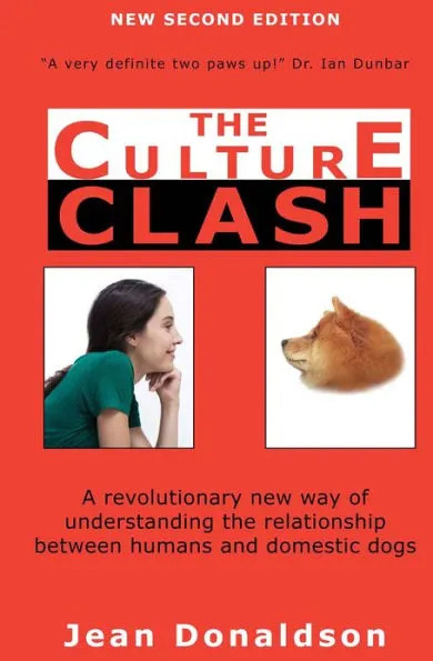 The cover of the book The Culture Clash is red and shows a young woman looking at a dog