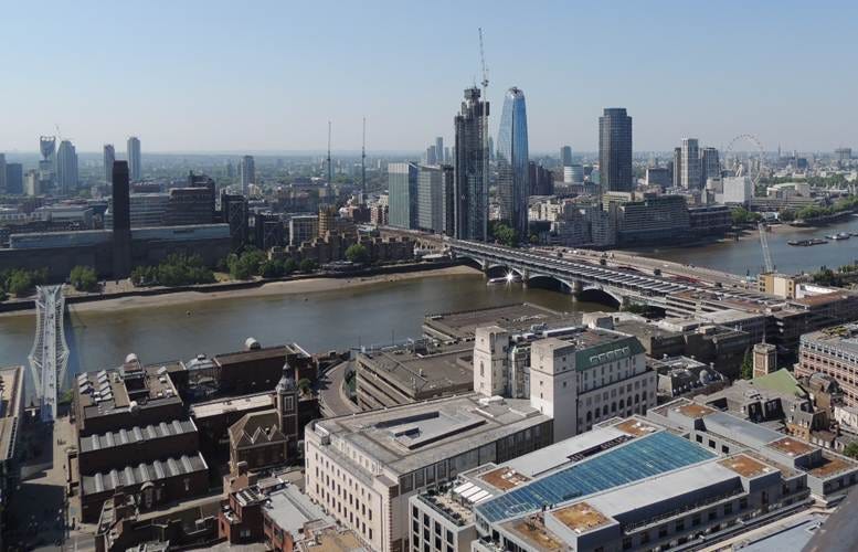 A cityscape with a river and a bridge

AI-generated content may be incorrect.
