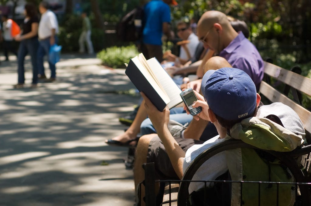 Photo of Man Reading