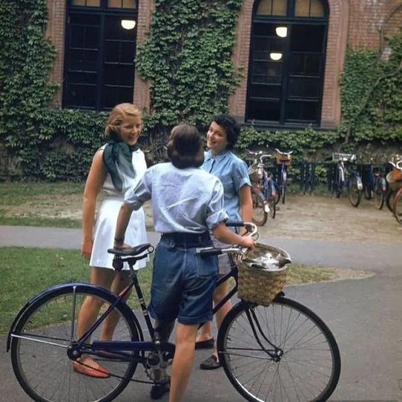 A candid shot of young women at Smith College in 1948, showcasing the era's typical casual academic attire. A candid shot of young women at Smith College in 1948, showcasing the era's typical casual academic attire.