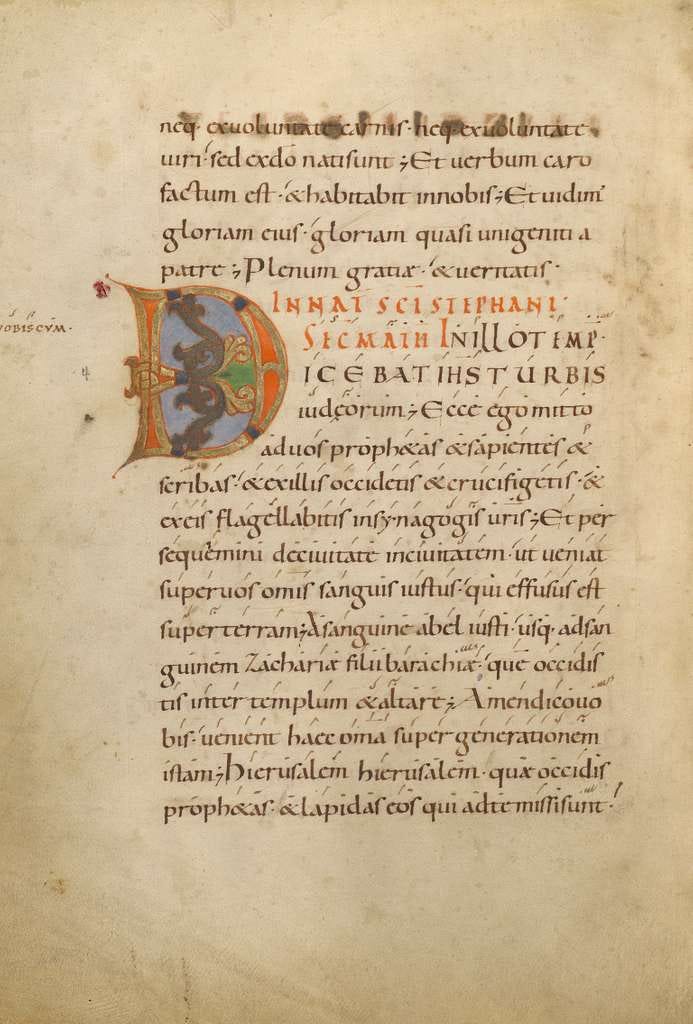 Scan of an illuminated manuscript page in Latin, with a decorated capital D Scan of an illuminated manuscript page in Latin, with a decorated capital D