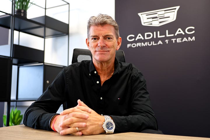 Cadillac F1 team principal Graeme Lowdon shows journalists around on a media day held at their UK satellite base in Silverstone.