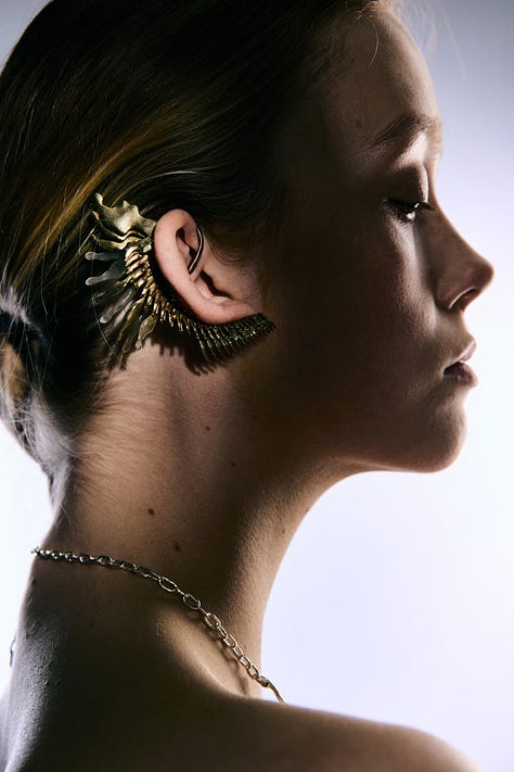 The In Trace of Every Vestige earcuff, the Broken Eggshell necklace and theIn Trace of Every Vestige necklace, by Yiran Li