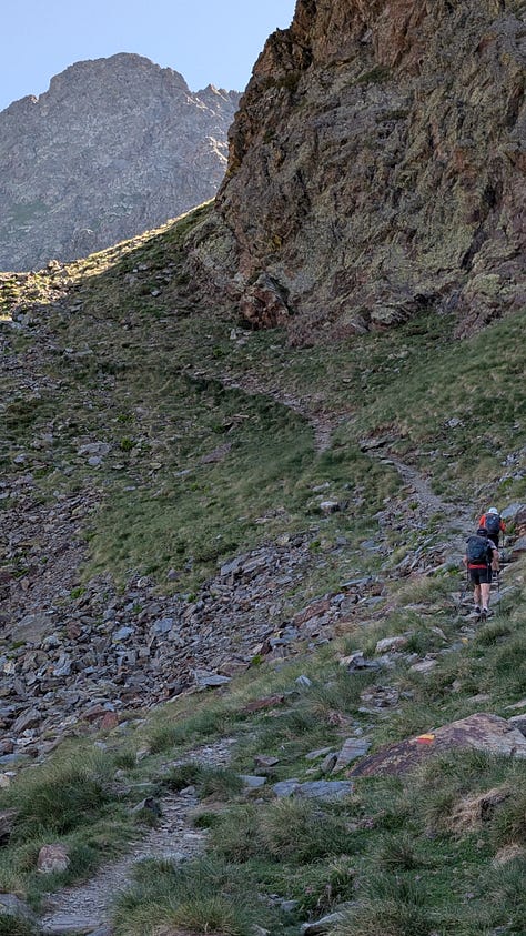 In the basin and climbing out.