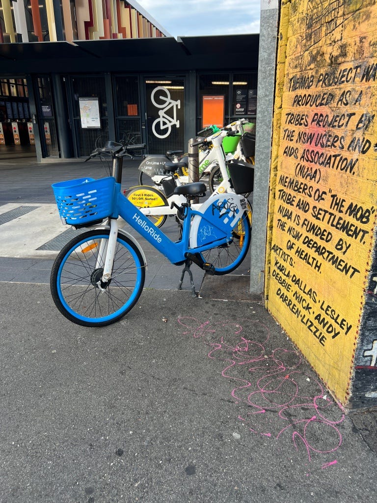 In front of Redfern Station, forces pedestrians to walk around instead of cutting the diagonal.