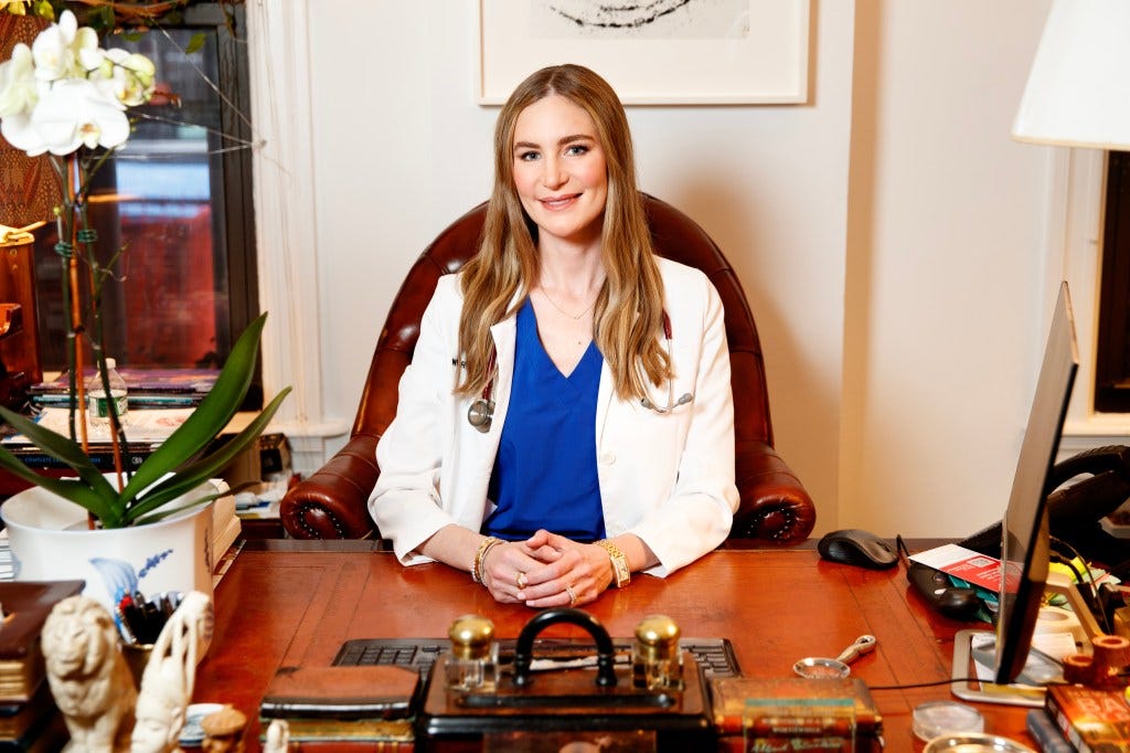 Dr. Amanda Kahn sitting at her desk in her Upper East Side office. Dr. Amanda Kahn sitting at her desk in her Upper East Side office.