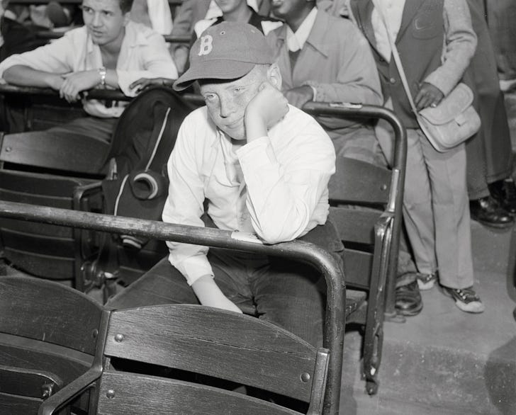 Brooklyn Dodger fan Alvin Vdell, age 14, reacts to the Giants winning the pennant.