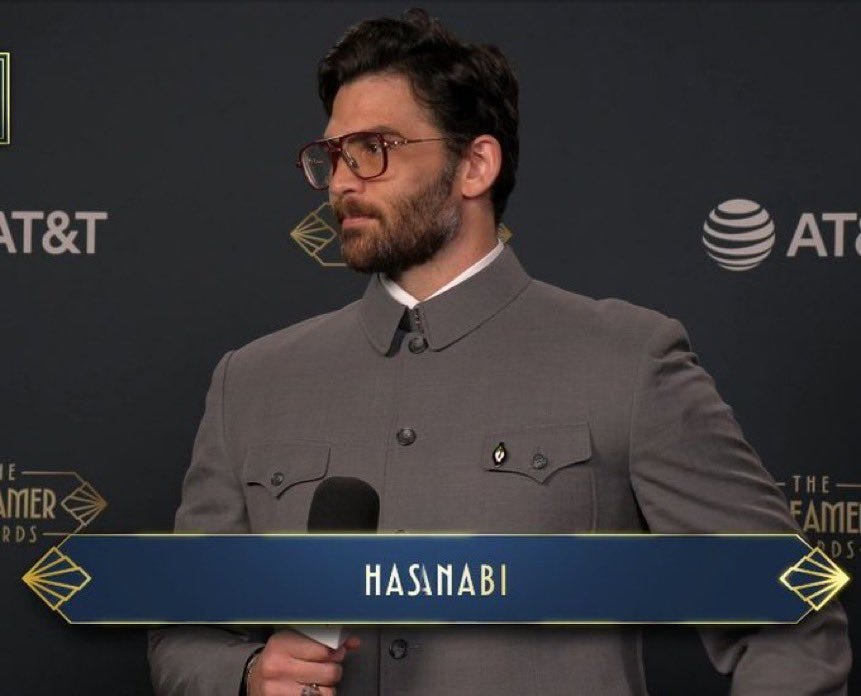 Hasan Piker thinks he's really funny wearing a Mao suit. The irony is that  if Mao came back to life he would take one look at Hasan and immediately  have him shot.