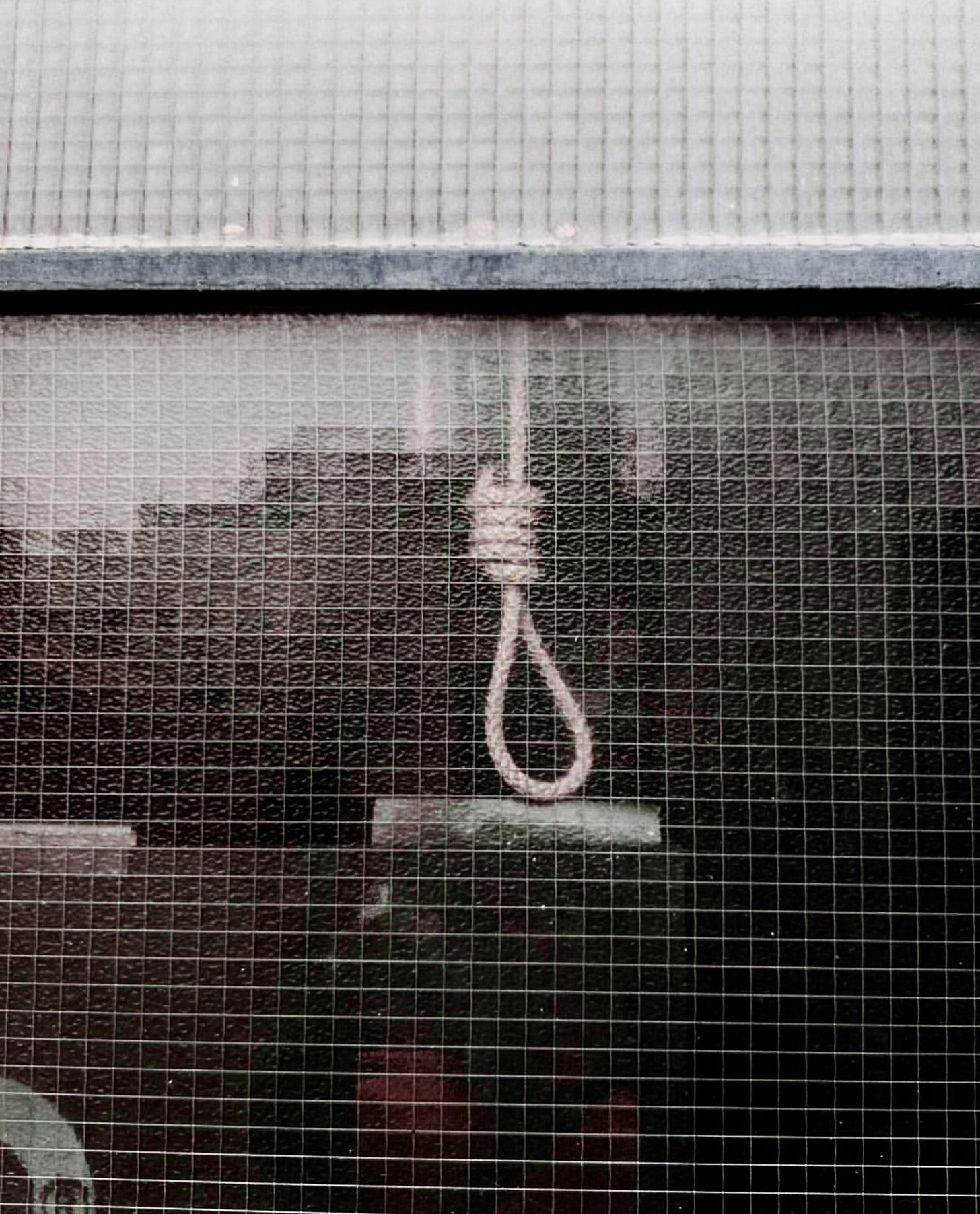 A photo of a noose. A photo of a noose.