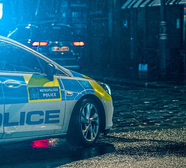 a police car parked on the side of the road