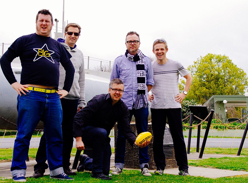 five blokes pose in front of the Holbrook submarine