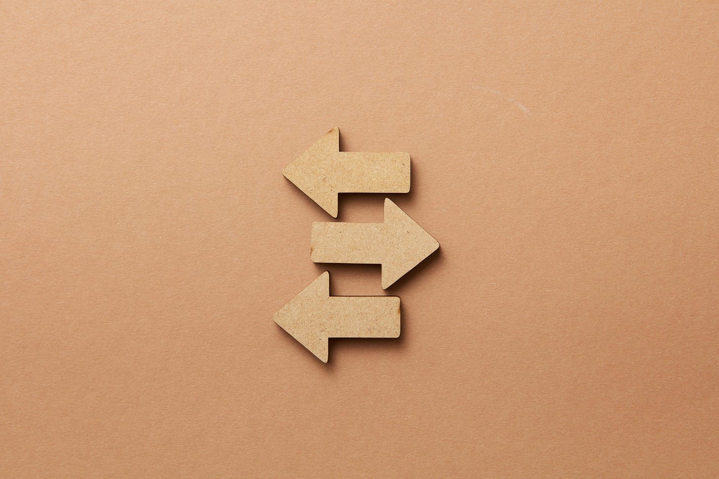 Opposite wooden arrows