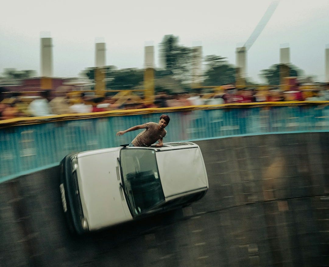 a dog is standing on top of a car a dog is standing on top of a car