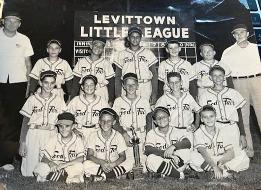 A group of young baseball players posing for a photo














The 1956 Levittown National Little League Champions Food Fair Team




