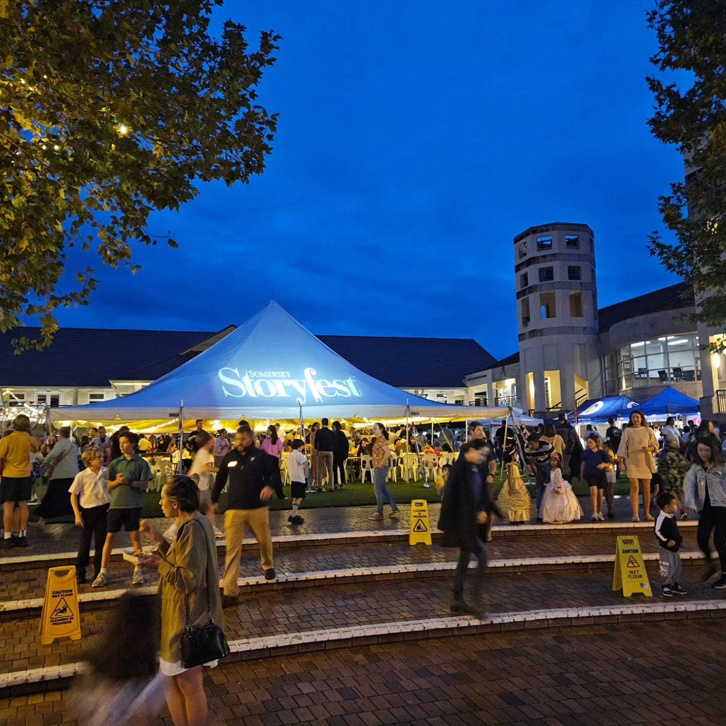 May be an image of 4 people and text that says "SOMERSET Story fest"