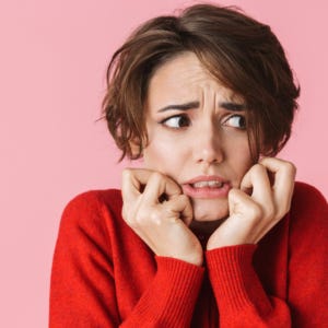woman in red, feeling unsure about Competition 