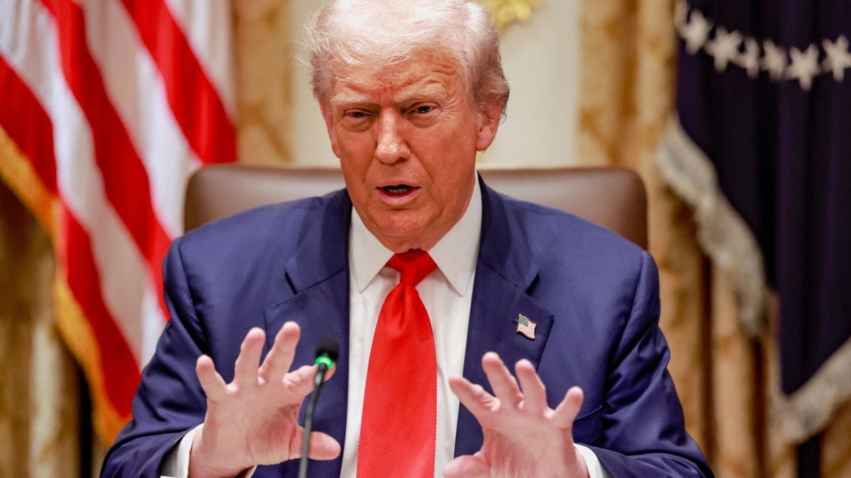 President Donald Trump gestures as he speaks during lunch with Argentina’s President Javier Milei (not pictured) in the Cabinet Room at the White House in Washington, D.C., on Oct. 14, 2025.