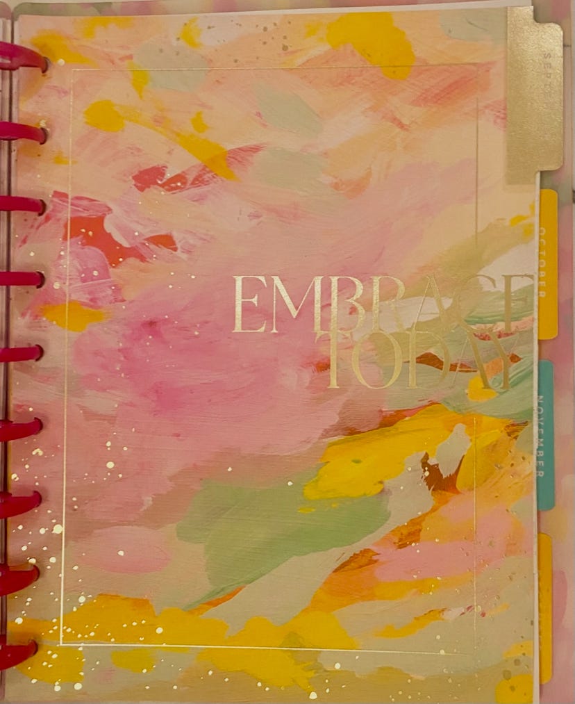 My happy planner September spread that says Embrace Today