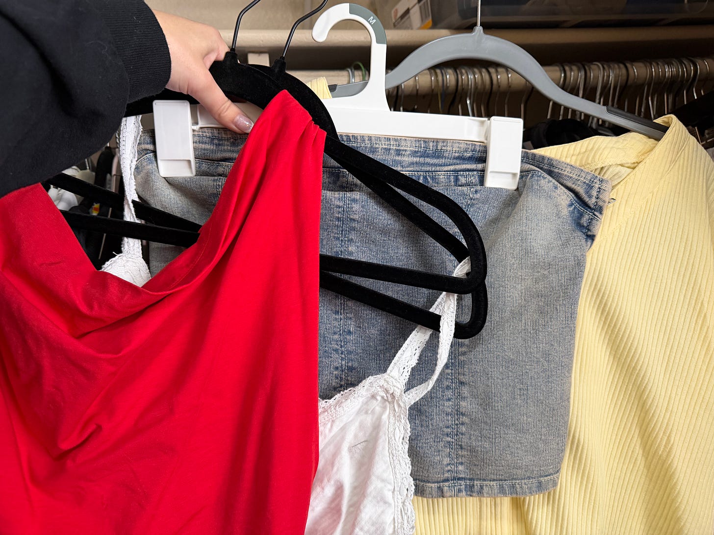 image: red shirt, white babydoll shirt, blue jean crop top, yellow shirt