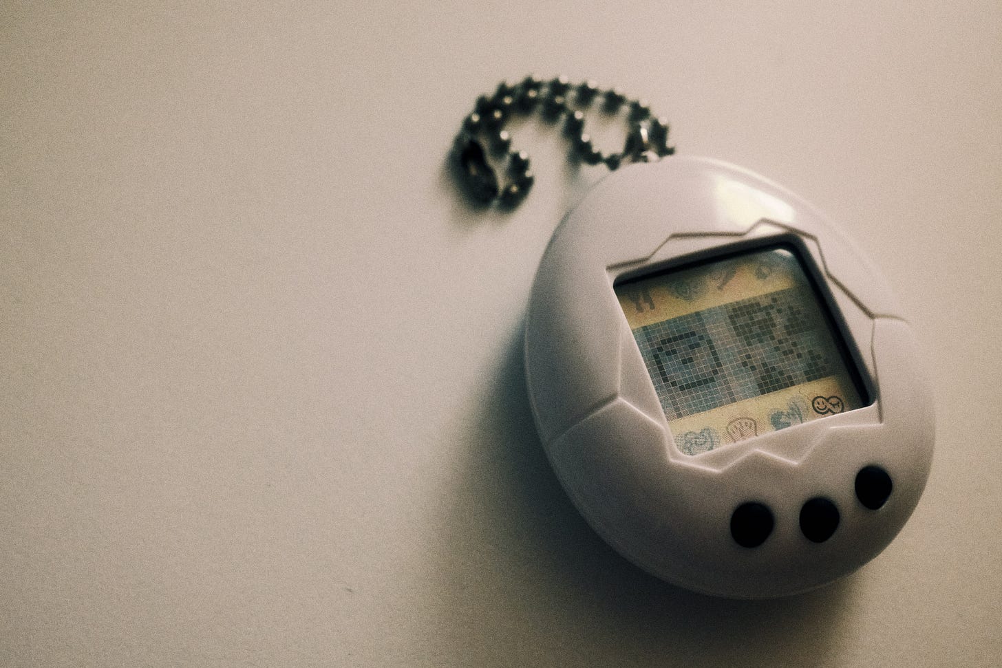 Photo of a tamagotchi toy Photo of a tamagotchi toy