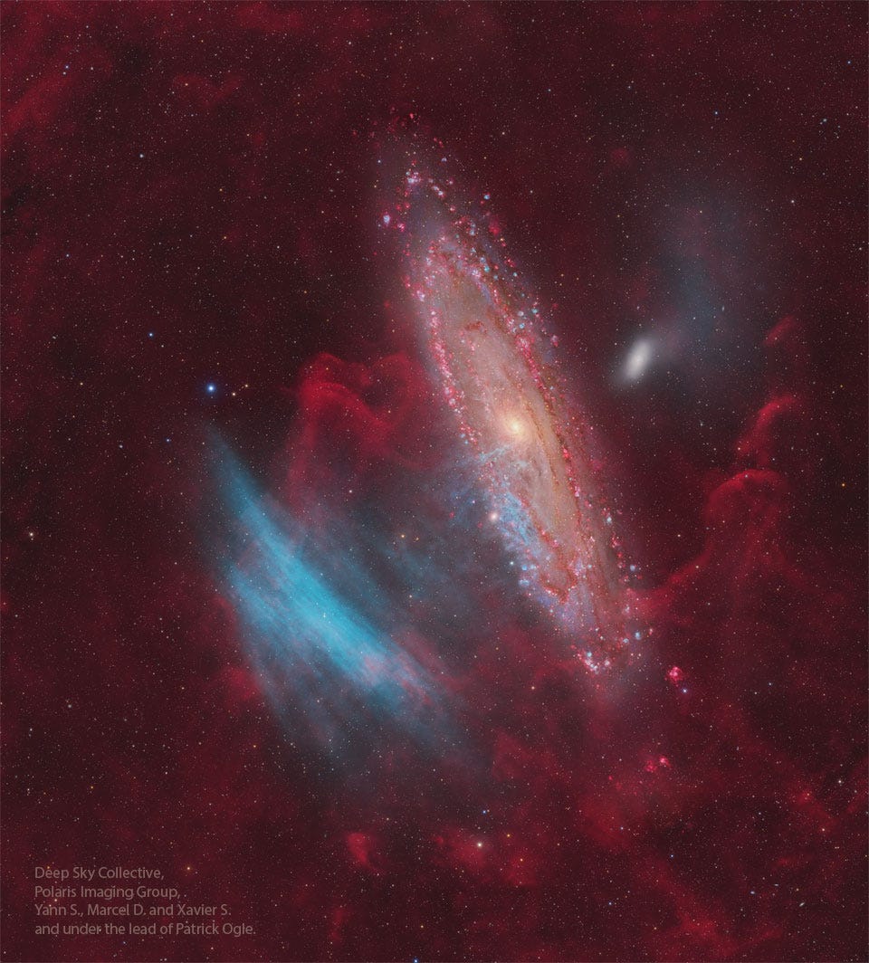 The Andromeda Galaxy is shown just right of center,
while some unusual blue arcs appear to its left. 
Please see the explanation for more detailed information.
