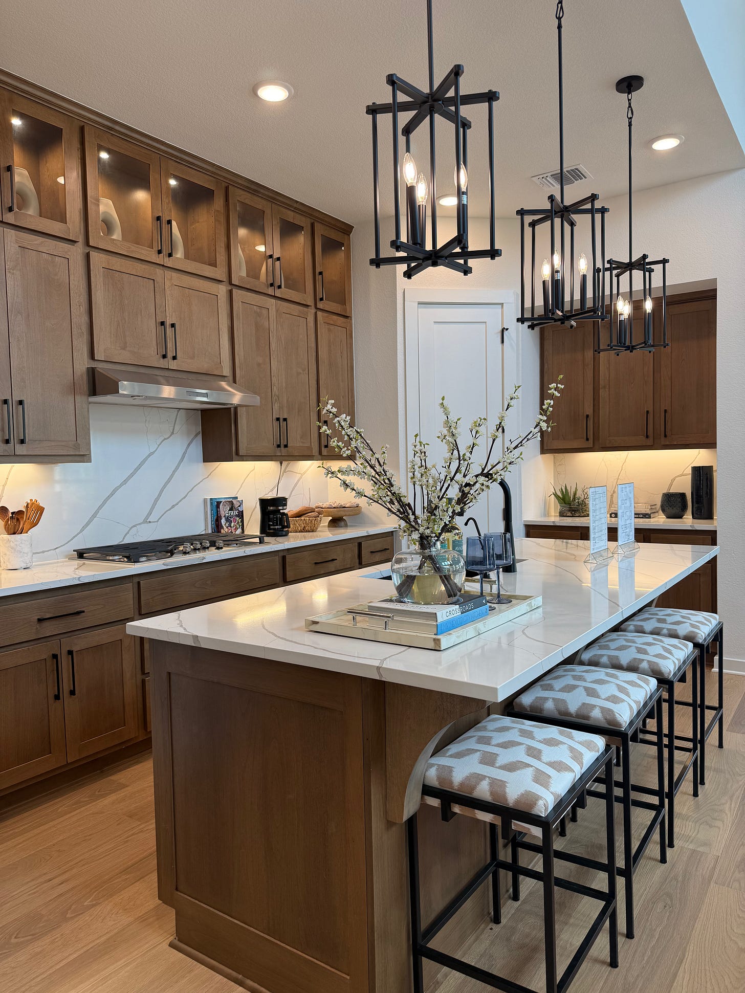 Updated kitchen in a Kyle or Buda home showing modern fixtures, clean staging, and natural light that communicate strong value to 2026 buyers. Updated kitchen in a Kyle or Buda home showing modern fixtures, clean staging, and natural light that communicate strong value to 2026 buyers.
