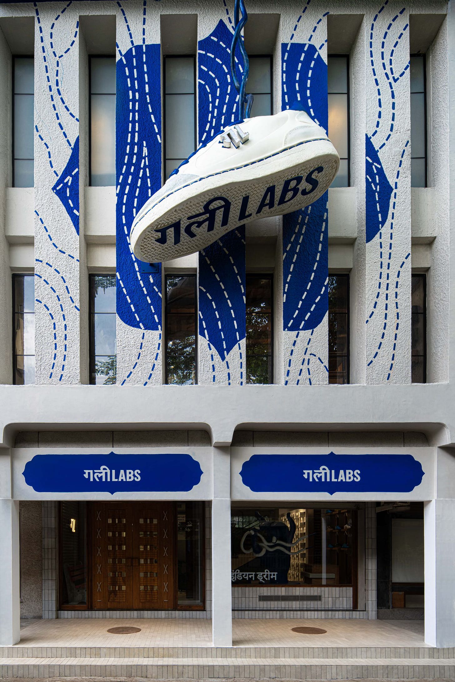 The store sat between multiple buildings with identical facades due to the implementation of facade control.