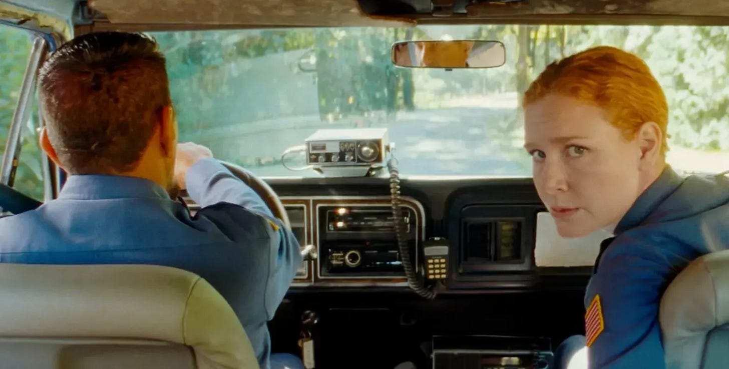 Pete and Gale in their police car