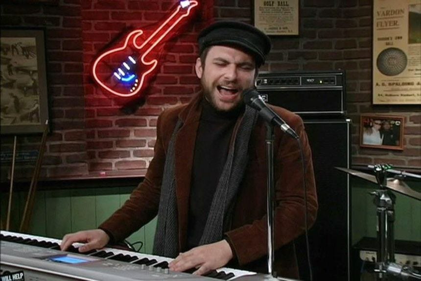 r/IASIP - Charlie Day singing into a microphone