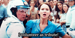 Hunger games meme of katniss saying 'I volunteer as tribute' Hunger games meme of katniss saying 'I volunteer as tribute'