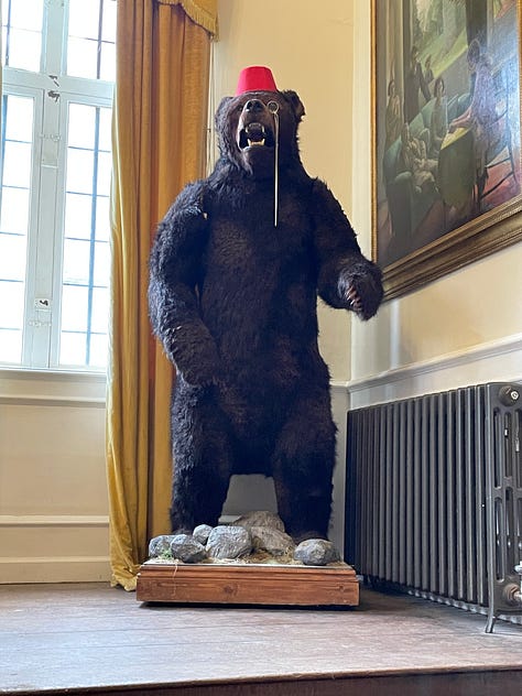 Various photos of our day at West Horsley, including a bear, lady Button's portrait and the girls posing next to a cardboard Pat