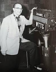 May be an image of 1 person, television and text that says 'ΝE CRANNEL5 5 CHANNEL WTTG' May be an image of 1 person, television and text that says 'ΝE CRANNEL5 5 CHANNEL WTTG'