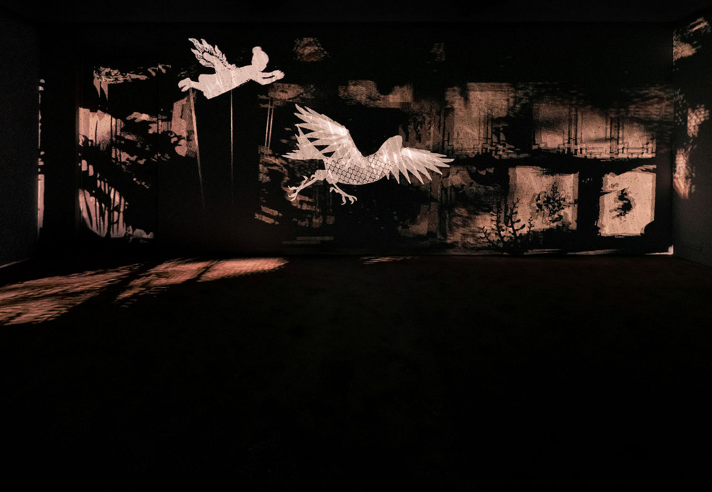 Image of multimedia installation with elements of shadow puppetry Image of multimedia installation with elements of shadow puppetry