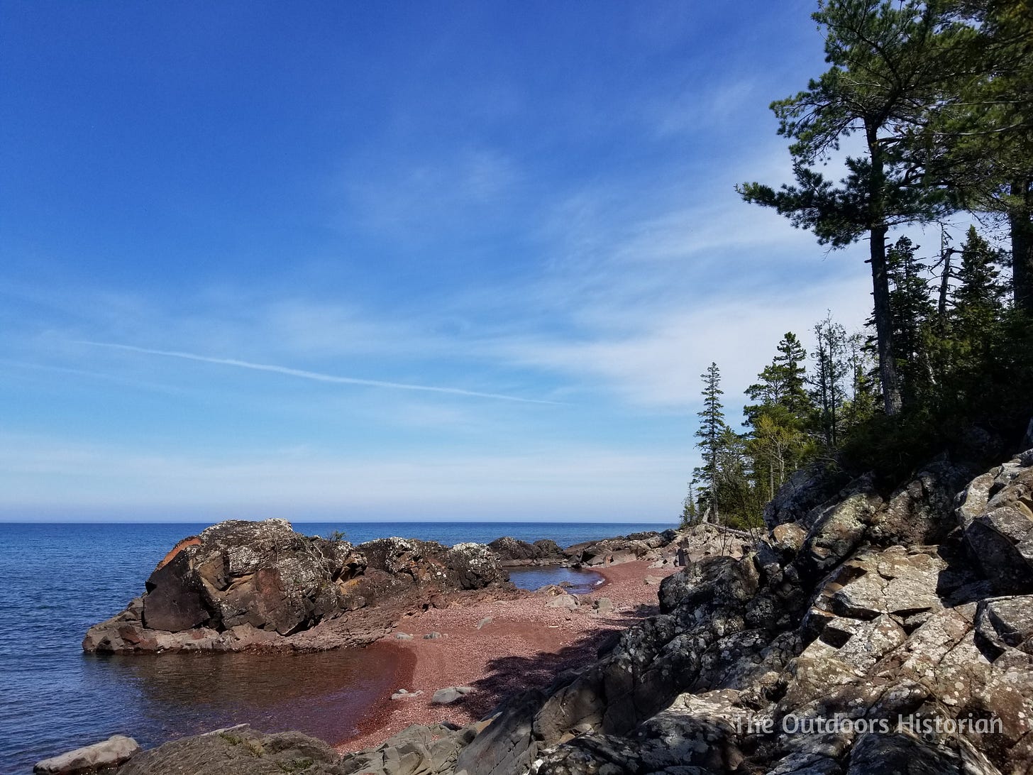 A section of Lake Superior Coast that is a mix of hunks of basalt rock intermixed with small cobbles and pebbles.