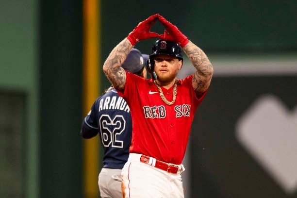 Alex Verdugo of the Boston Red Sox gestures after hitting a double in the third inning against the Tampa Bay Rays on September 27, 2023 at Fenway...
