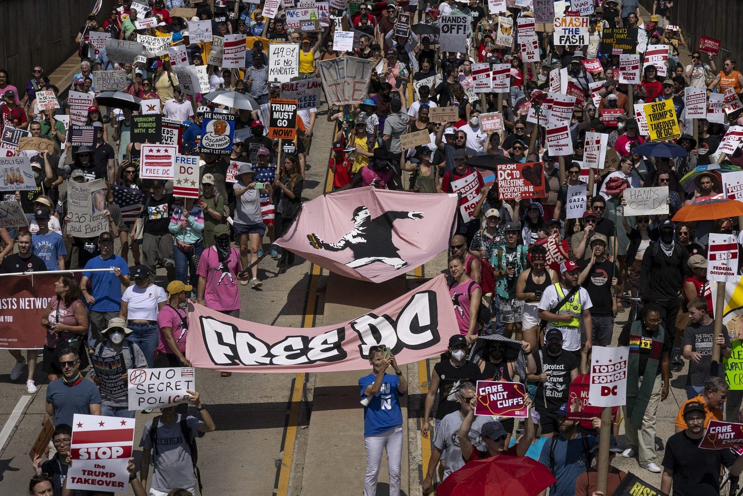 Thousands of demonstrators march from Meridian Hill Park to Freedom Plaza during the "We Are All DC: A National March" on September 6, 2025 in Washington, D.C. Photo by MEHMET ESER/Middle East Images/AFP via Getty Images