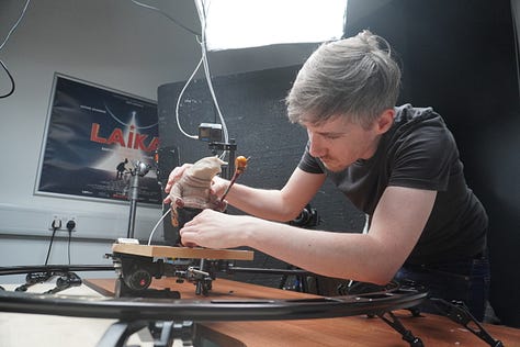 photo of animator adjusting model; illustrations of stop motion model; the rig used to take the capture of model