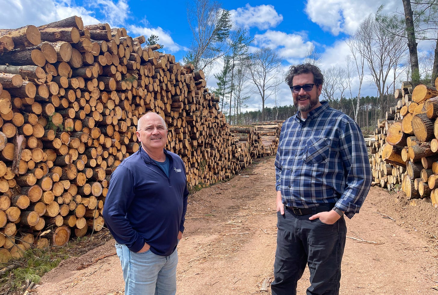 Clay Rice of Northstar Restoration stands with restoration expert Andrew McCabe during a tour of tornado-damaged areas in Ringle.