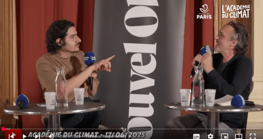 Albert Moukheiber being interviewed at a climate conference.
