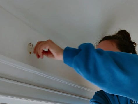 Various pictures showing various states of repairs from plugs being pulled out of the wall, to a wallpaper stripped wall with cracks, to.wall cracks being filled, to two freshly sanded floors and wall painted white