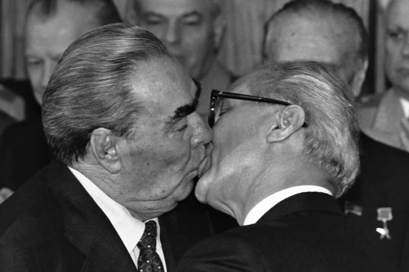 Soviet leader Leonid Brezhnev warmly greets East German leader Erich Honecker during the 30th anniversary celebrations of the German Democratic Republic in East Berlin, October 1979.