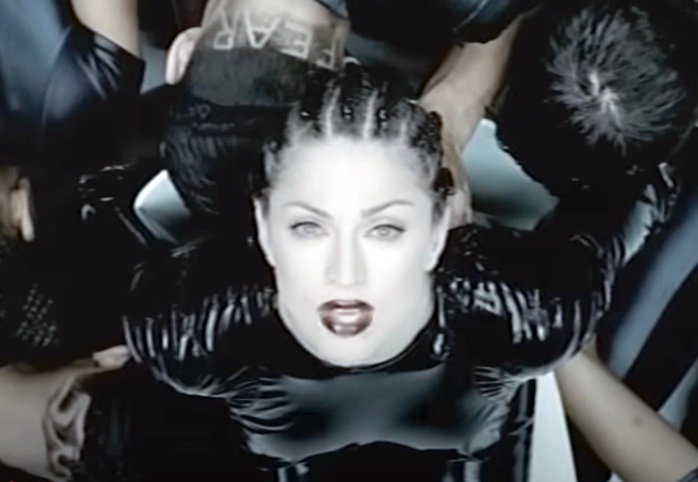 Madonna in Human Nature video shot from above looking into camera