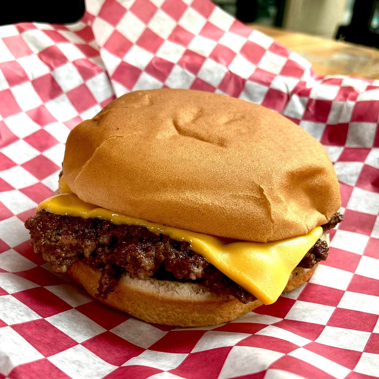 May be an image of burger and chicken sandwich