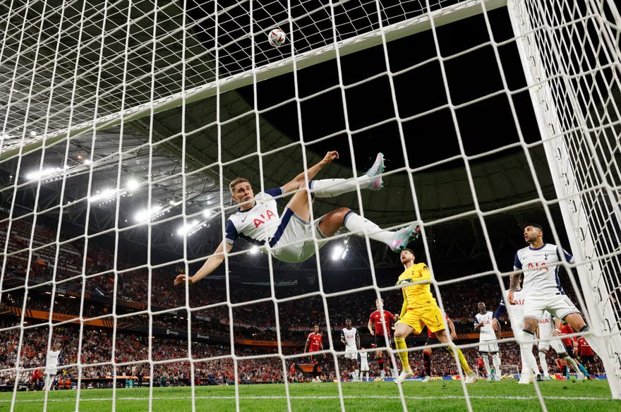 Tottenham’s Micky van de Ven acrobatically clears a Rasmus Højlund header off the line in the second half. Photograph: Andrew Couldridge/Reuters