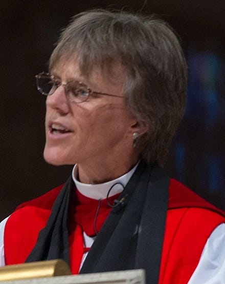 three quarter headshot of Budde; white woman with glasses, grey hair, wearing bishops robes