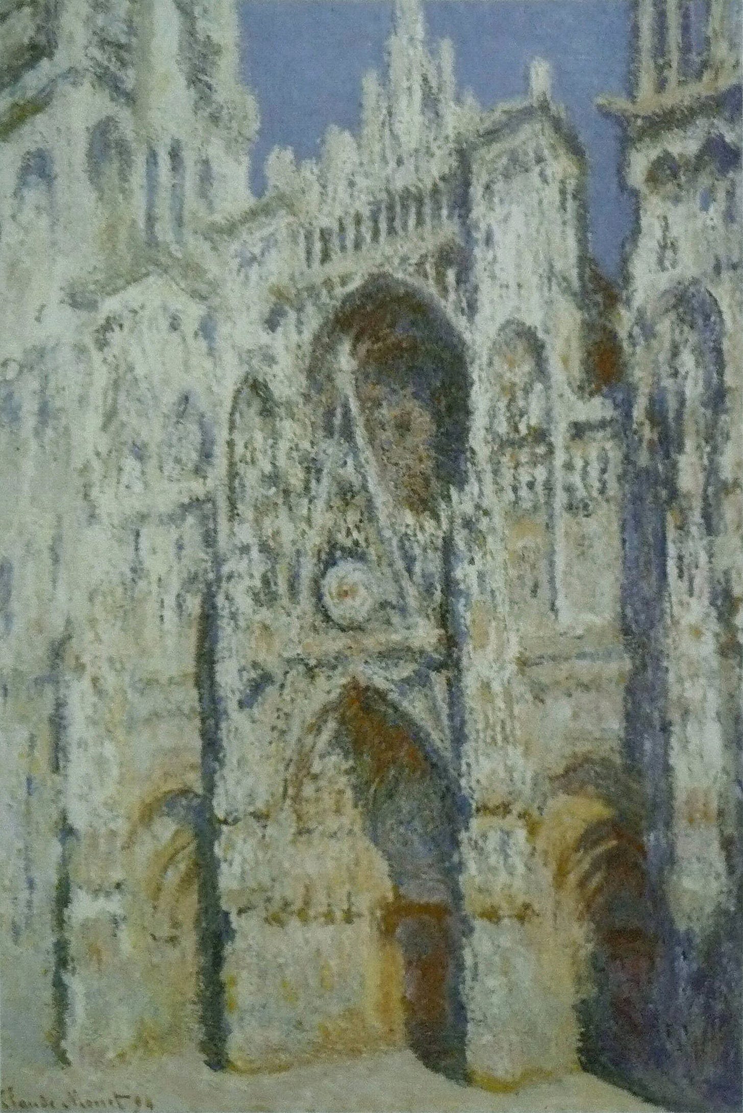Monet's Rouen Cathedral portal and Saint-Romain tower in gold and blue sunlight Monet's Rouen Cathedral portal and Saint-Romain tower in gold and blue sunlight