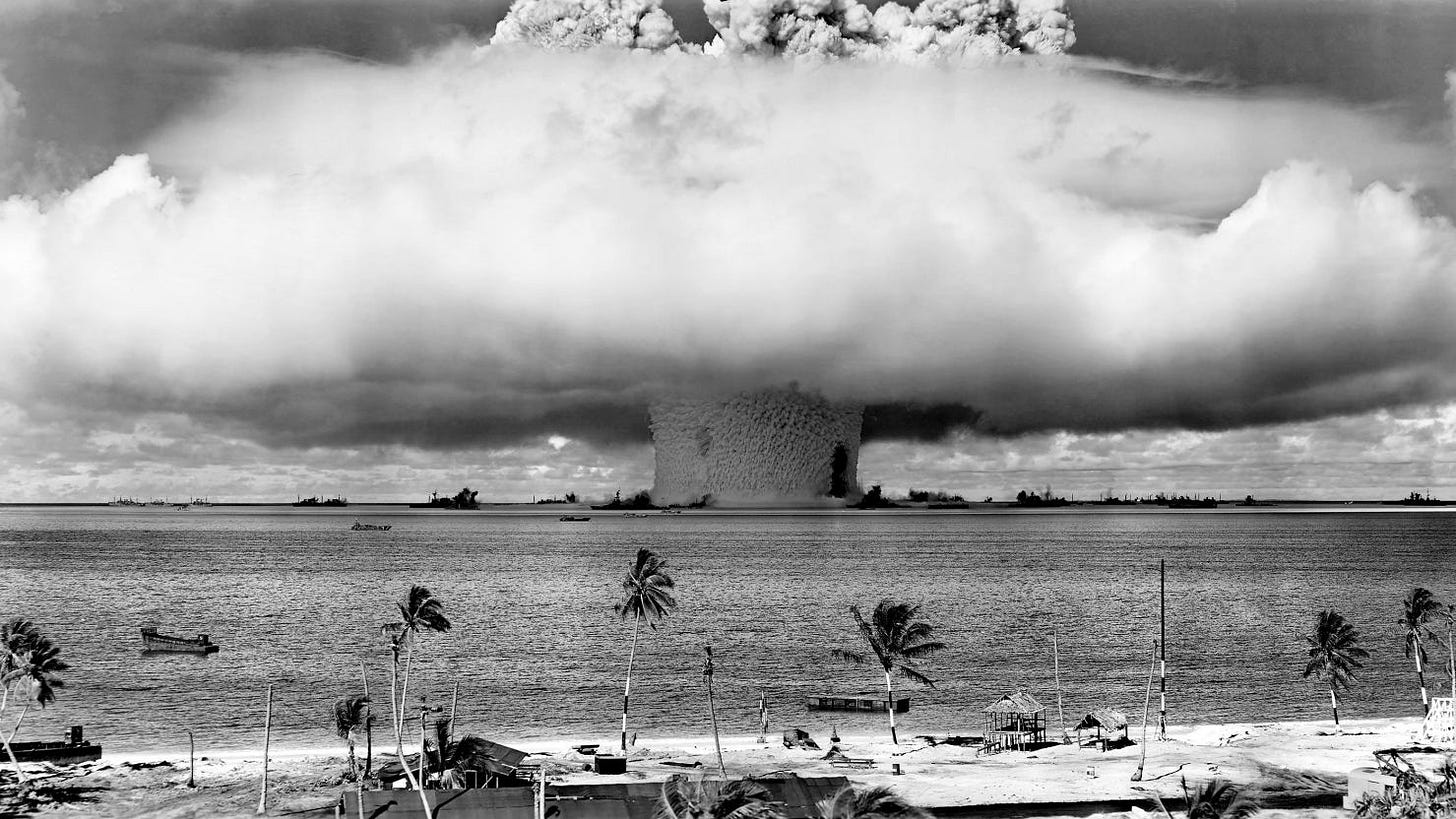 A mushroom-shaped cloud and water column produced from the underwater Baker nuclear explosion of July 25, 1946, in the Marshall Islands.