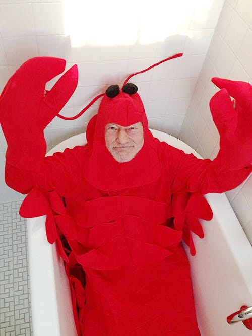 Patrick Stewart wearing a ridiculous lobster costume (and a ridiculous grin on his stubbly face), lying in a bathtub, from his Twitter on Halloween, 2013 Patrick Stewart wearing a ridiculous lobster costume (and a ridiculous grin on his stubbly face), lying in a bathtub, from his Twitter on Halloween, 2013